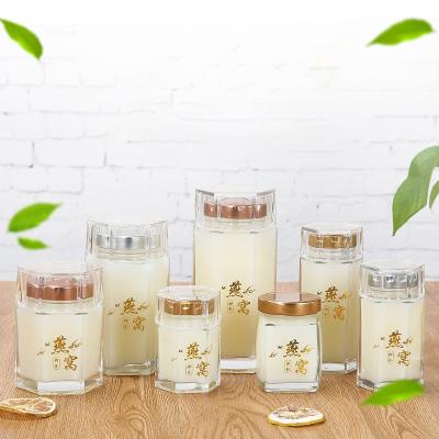 Nível superior Honey Jars Clear Color With de vidro sextavado Eco amigável