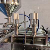 La crème de sauce collent la bouteille d'eau horizontale principale semi automatique liquide Honey Filler de machine de remplissage