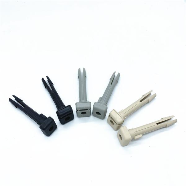 REAR SEAT CENTRE HEADREST INSERT TUBE GUIDE LOCK