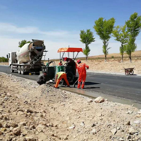 Drainage Channel Construction | Concrete Slipform Paver Application