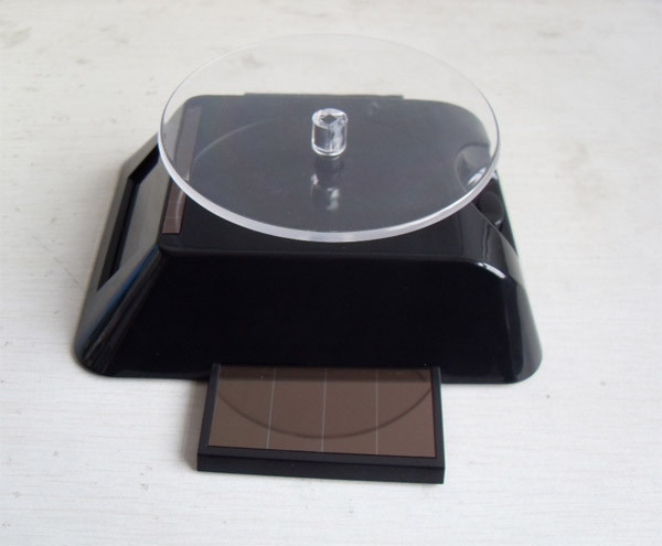 Rechtslauf / linkslauf mode ABS solar Rotary display holder with retractable solar panel