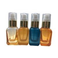 SGS ISO MSDS Orange Blue 20ml Glass Pump Bottle For Lotion And Serum