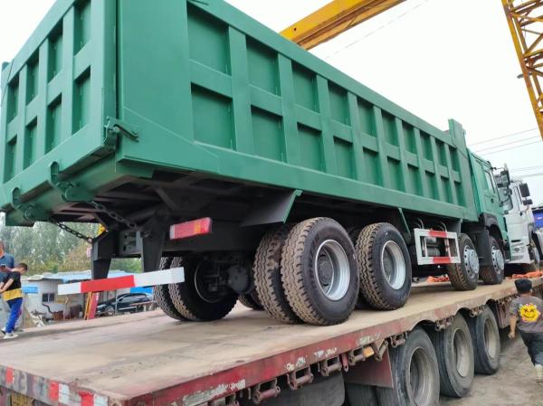 Estilo de elevação frontal 375HP Sinotruk HOWO 8*4 camião de descarga camião de segunda mão para descarga