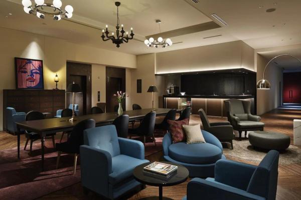 Darwin hotel style apartment samll space furniture by single bed with dining table and leather sofa chair