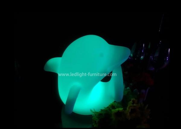 O candeeiro de mesa colorido bonito da luz da noite do golfinho do feriado Eyes a produção para a sala