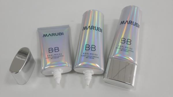 Tubo cosmético estratificado holográfico oval liso metálico que empacota o material de laser colorido do brilho da natureza