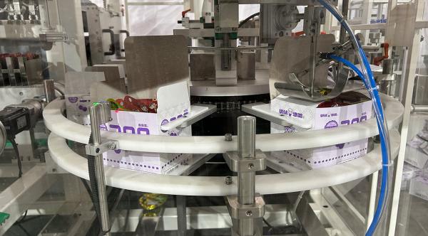 Automatic Gummy Candy Sachet Vertical Cartoning Machine with Magazine Counting and Servo Transfer System