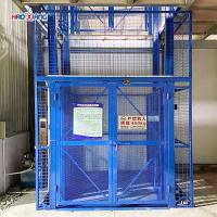 20000 kg élévateur de marchandises industrielles élévateur de marchandises vertical bleu avec rails de guidage