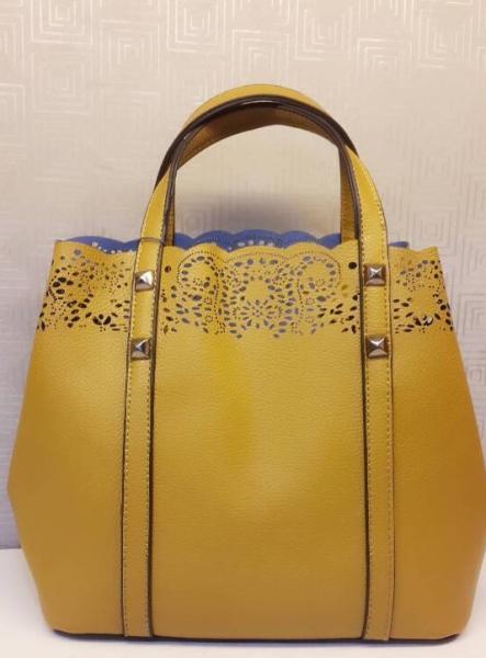 2016 new summer temperament simple casual hollow handbag shoulder bag