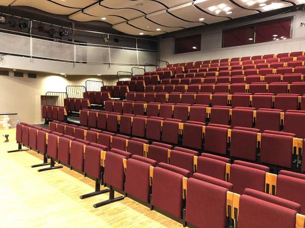 Riser Mounted Retractable Bleacher Seating Theaters Chair With Red Fabric Upholstery