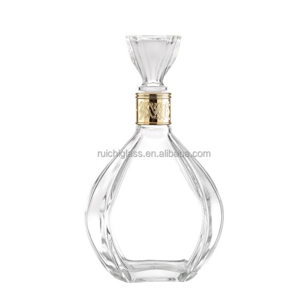 Fabricación personalizada de botellas de vidrio de estampado caliente para tipos irregulares de whisky y vodka