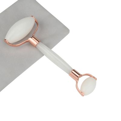 O dobro branco de quartzo do rolo da cara da ametista silenciosa tomou partido Jade Roller