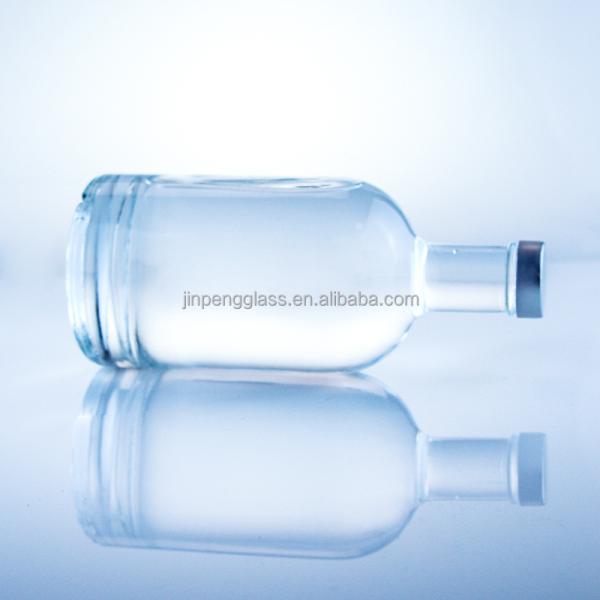 Botella redonda de vidrio de 375 ml Botella vacía clara para bebidas alcohólicas con manipulación superficial de grabado ácido