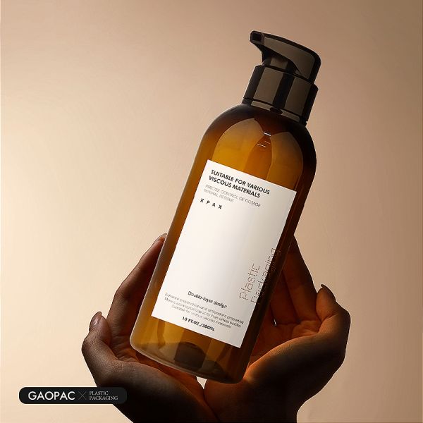 Customized Color Boston Round Plastic Shampoo Bottle with Press Pump in 300/400/500/600ml Capacity