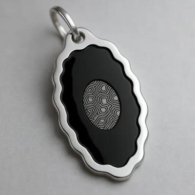 Stylish Men's Pendant features a metal frame with  a black body and a geometric pattern design