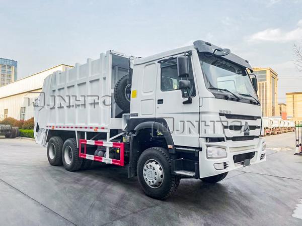 Camion accrochant Sinotruk Howo de compacteur de déchets du seau 16CBM