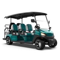 Un chariot de golf électrique offrant une capacité de 4 + 2 places dans une finition vert émeraude pour une expérience de golf luxueuse et unique