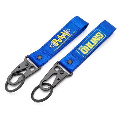 Ceinture d'engrenage de qualité professionnelle. Graphique dynamique absorbant les chocs + double porte-clés. Conçu pour les amateurs de sport automobile.