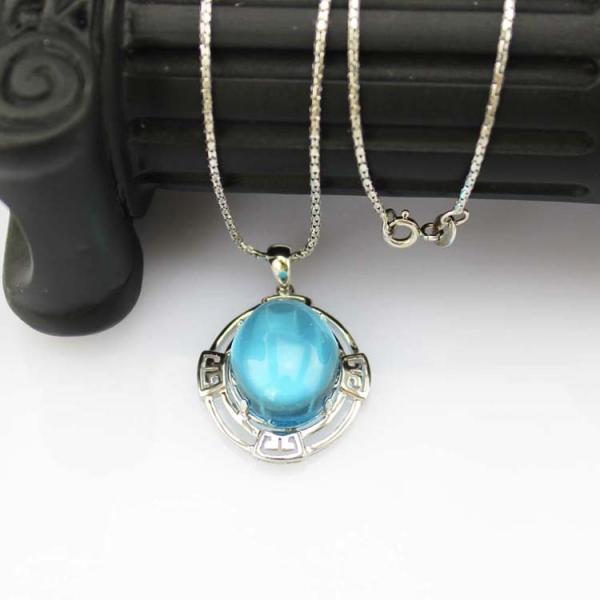 Sterling Silver Oval Dome Created Blue Topaz Cubic Zirconia Pendant  Silver Chain (PSJ0359)