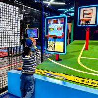Machine de tir de basket-ball à commande de pièce de monnaie