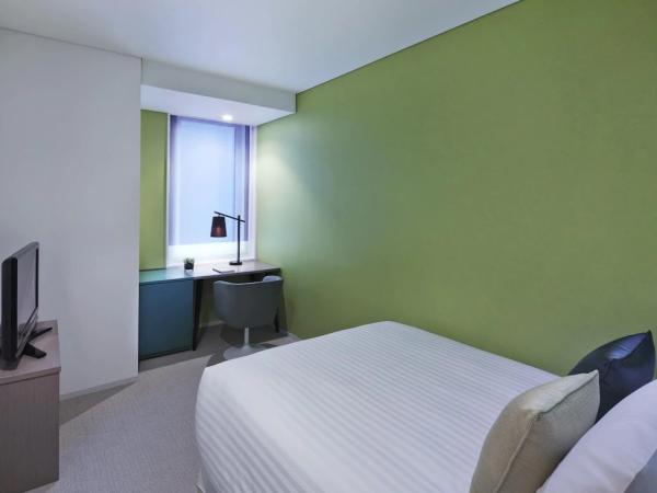 Darwin hotel style apartment samll space furniture by single bed with dining table and leather sofa chair