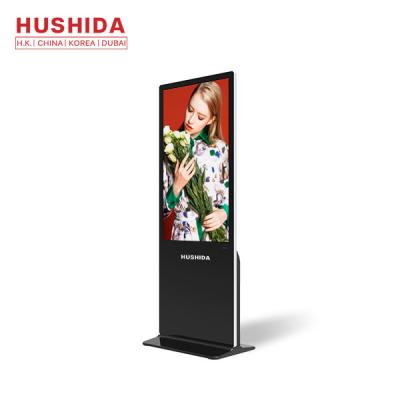 HUSHIDA assoalho comercial de 65 polegadas que está o Signage HD completo de Digitas que anuncia o quiosque da exposição