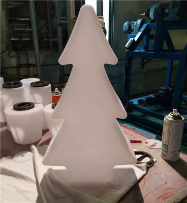 Árvore de Natal moldando rotatória da lâmpada