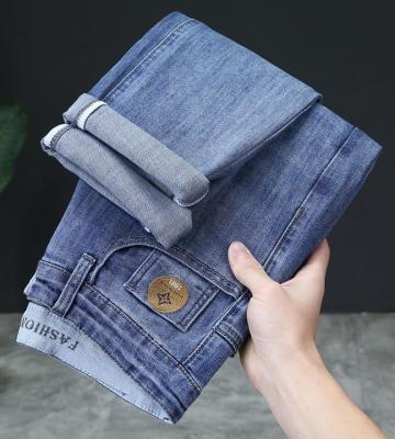 O fabricante Fashion Big Loose do vestuário relaxou calças de brim retas do pé