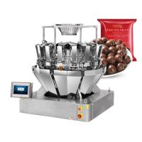 Máquina automática de llenado de botellas de chocolate mezcladas con gránulos de plástico