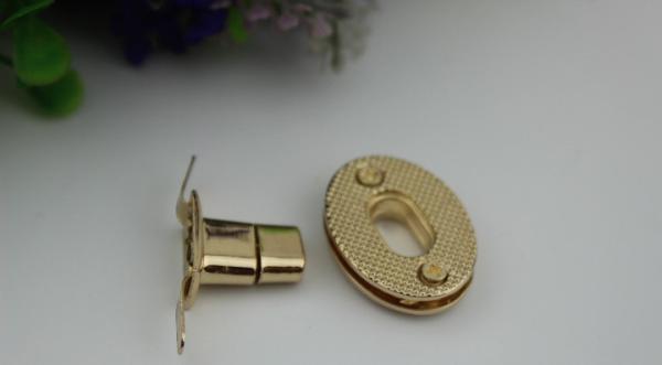 High quality small oval shape metal handbag accessories gold twist turn lock