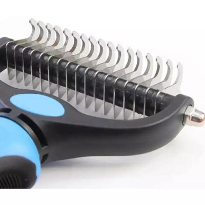 O pente de Cat Dog Pet Shedding Dematting Deshedding escova por muito tempo o punho de aço inoxidável