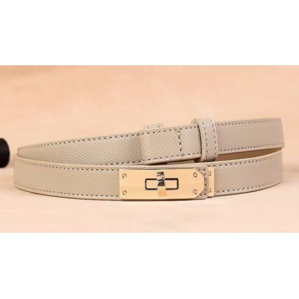 Adjustable belt, alloy buckle, leather texture, fashion accessory, minimalist design, skirt accessory, dress accessory