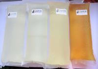 Resistencia al arrastramiento amarillo claro translúcido adhesivo de fusión en caliente para laminados no tejidos