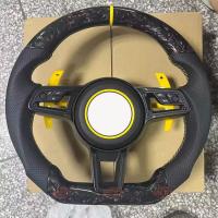 Toda la serie de ruedas de dirección de piel de fibra de carbono P-o-rsche han sido modificadas