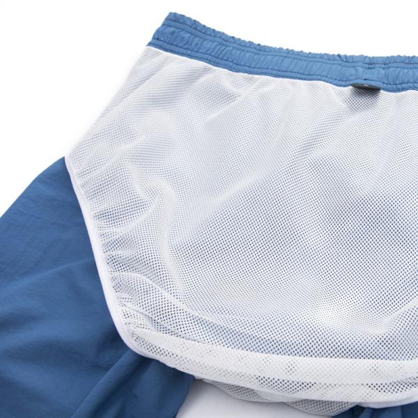 Брюки пляжа сплошного цвета шортов людей случайные быстрые сухие