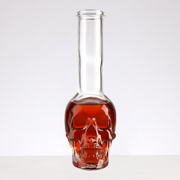 Clients' Specific Requirements Transparent Glass Bottles with Skull Shaped Long Neck