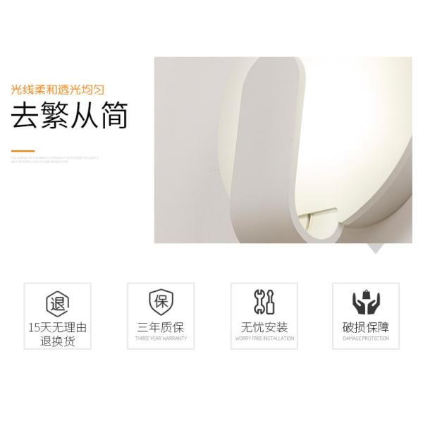 Modern simple and creative bedroom bedroom iron art wall lamp.
