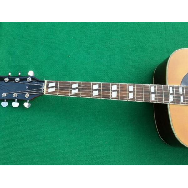 2018 Orange Sunburst Dovo acoustic guitar