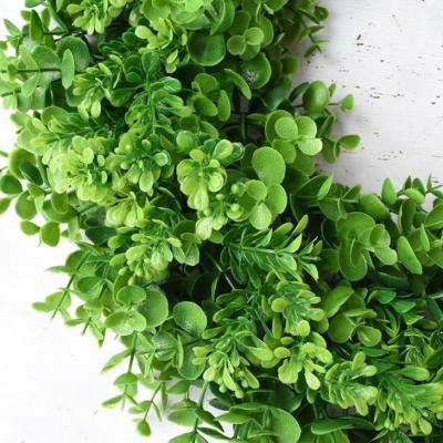 Os painéis de parede artificiais da planta da casa telham festões da flor artificial para a decoração