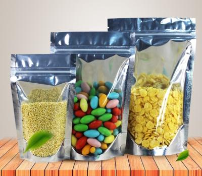 Fortes laminados estão acima do malote claro do zíper que imprime o saco do reforço