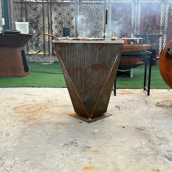 Outdoor Corten Steel BBQ Grill With Wood Storage And Natural Rusty Surface