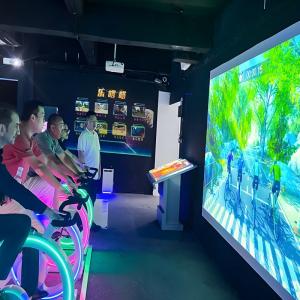 ビデオプロジェクター付きの運動自転車 インタラクティブなプロジェクションゲーム サイクリングシミュレーター