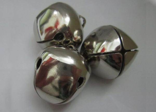 Holiday decorations silver cross jingle bell Holiday decorations silver cross jingle bells