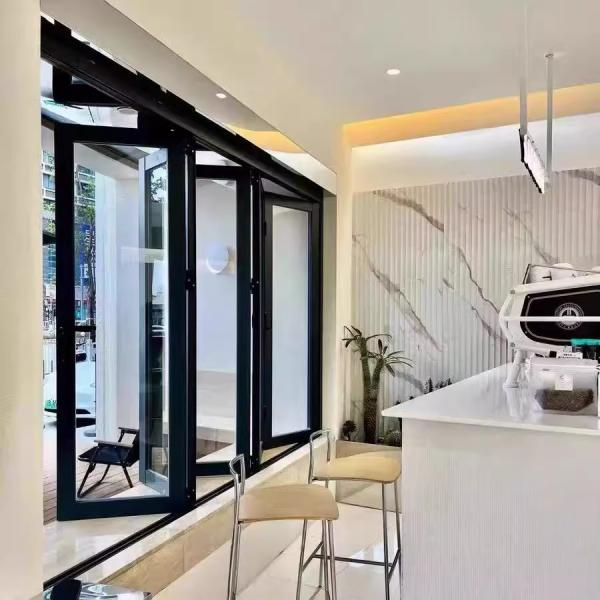 Structural Silicone Glazed Folding Windows - Flush Glass Appearance