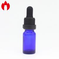 10ml a fileté la bouteille bleue en verre d'huile essentielle avec le chapeau de compte-gouttes