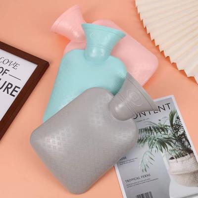 Bouteille d'eau chaude en silicone douce et écologique pour voyager et soulager la douleur
