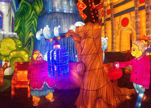 Beautiful Golden Fabric Chinese Lanterns Tree Interacting With Children And Adults