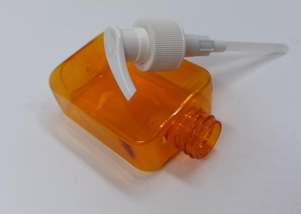 O cosmético plástico liso claro alaranjado engarrafa o recipiente 180ml do ANIMAL DE ESTIMAÇÃO do creme de corpo da lavagem da mão
