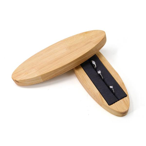 Dispositif de bijoux en bois discret ovale