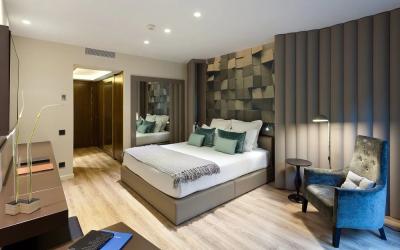 Swaziland hotel furniture supplier from China factory for upholstered bed with TV stand and Wardrobe cabinet
